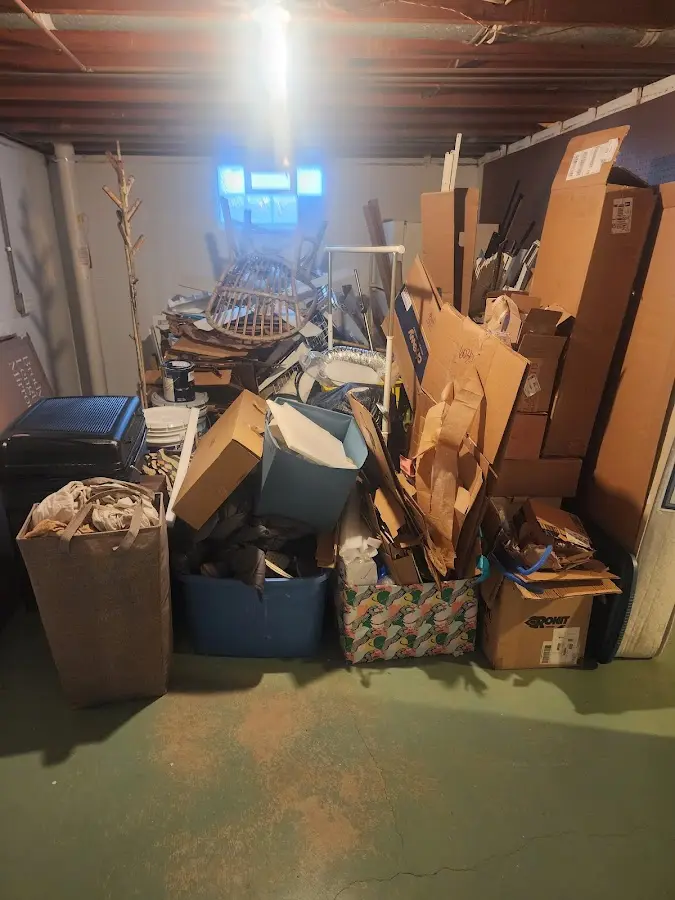 Roll-off dumpster container at job site for 2 Yard Dumpster Rental in Clark